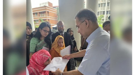 তিন প্রতিবন্ধীর হাতে নিয়োগপত্র তুলে দিয়েছেন প্রধানমন্ত্রী